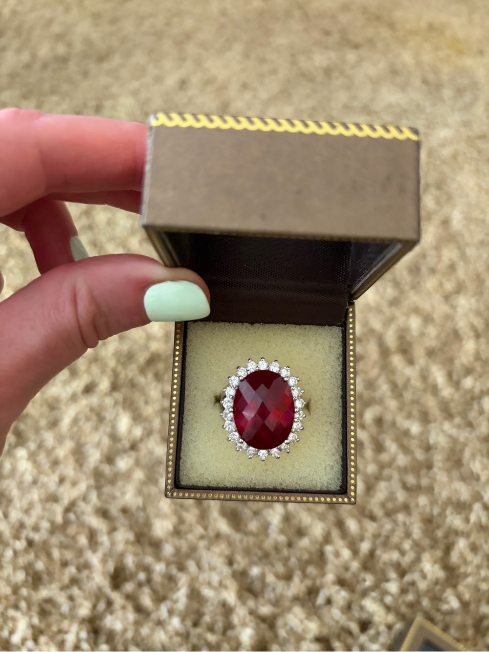 Elegant Red Oval Cocktail Ring with Halo Accents